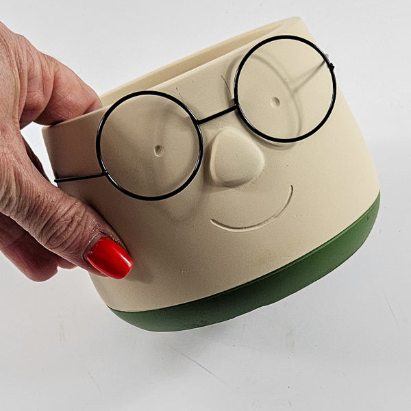 Face with glasses planter